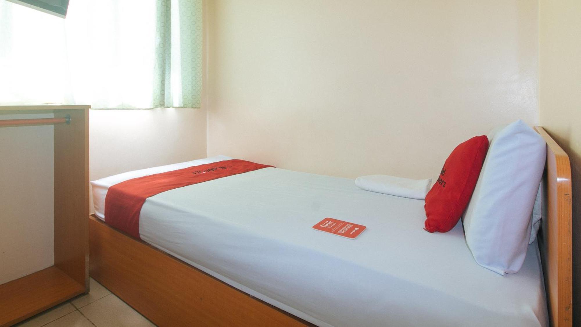 Reddoorz @ Asiana Pension Inn Мандауэ Экстерьер фото