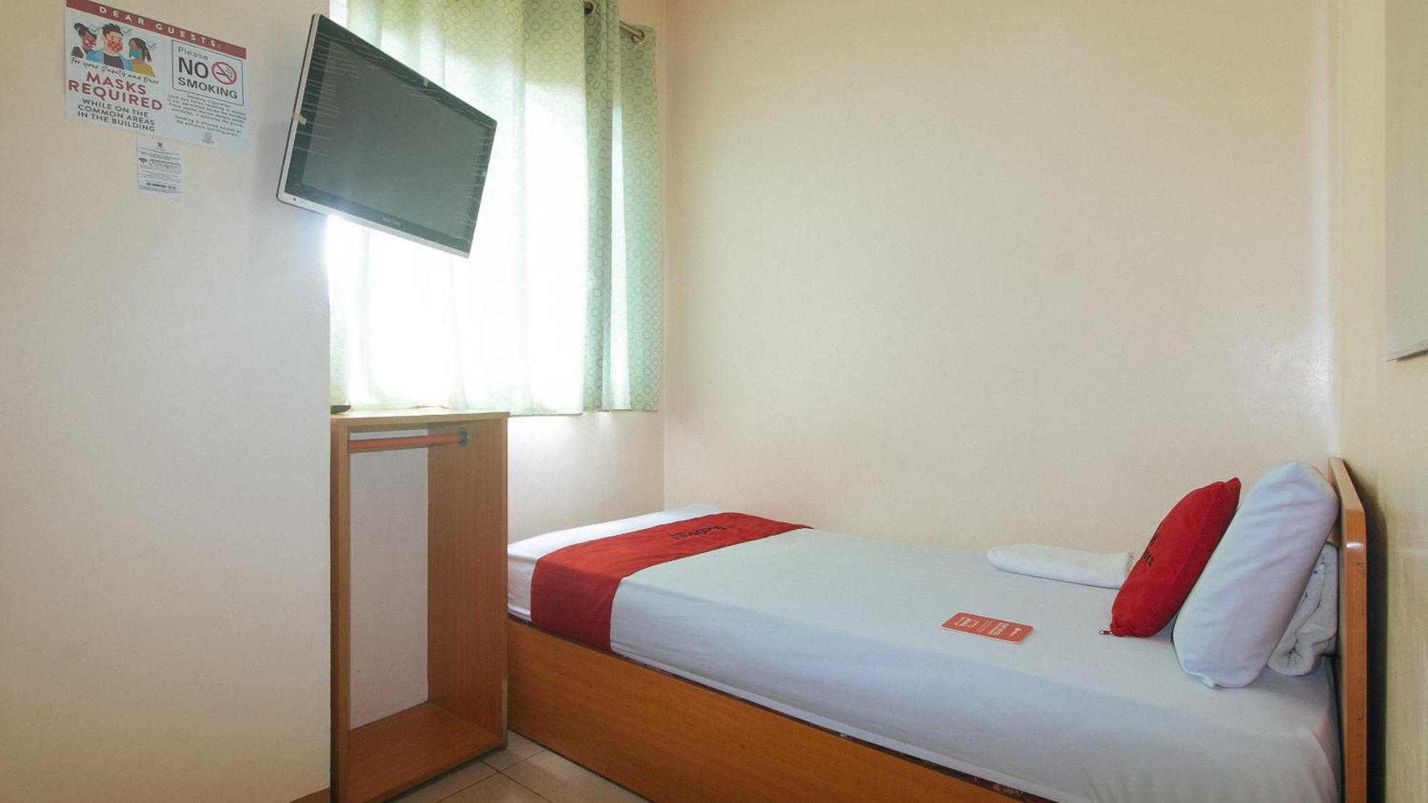 Reddoorz @ Asiana Pension Inn Мандауэ Экстерьер фото