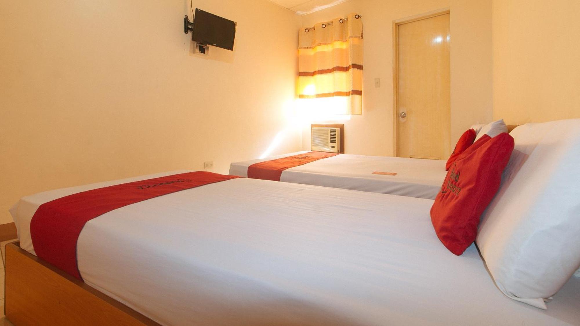 Reddoorz @ Asiana Pension Inn Мандауэ Экстерьер фото