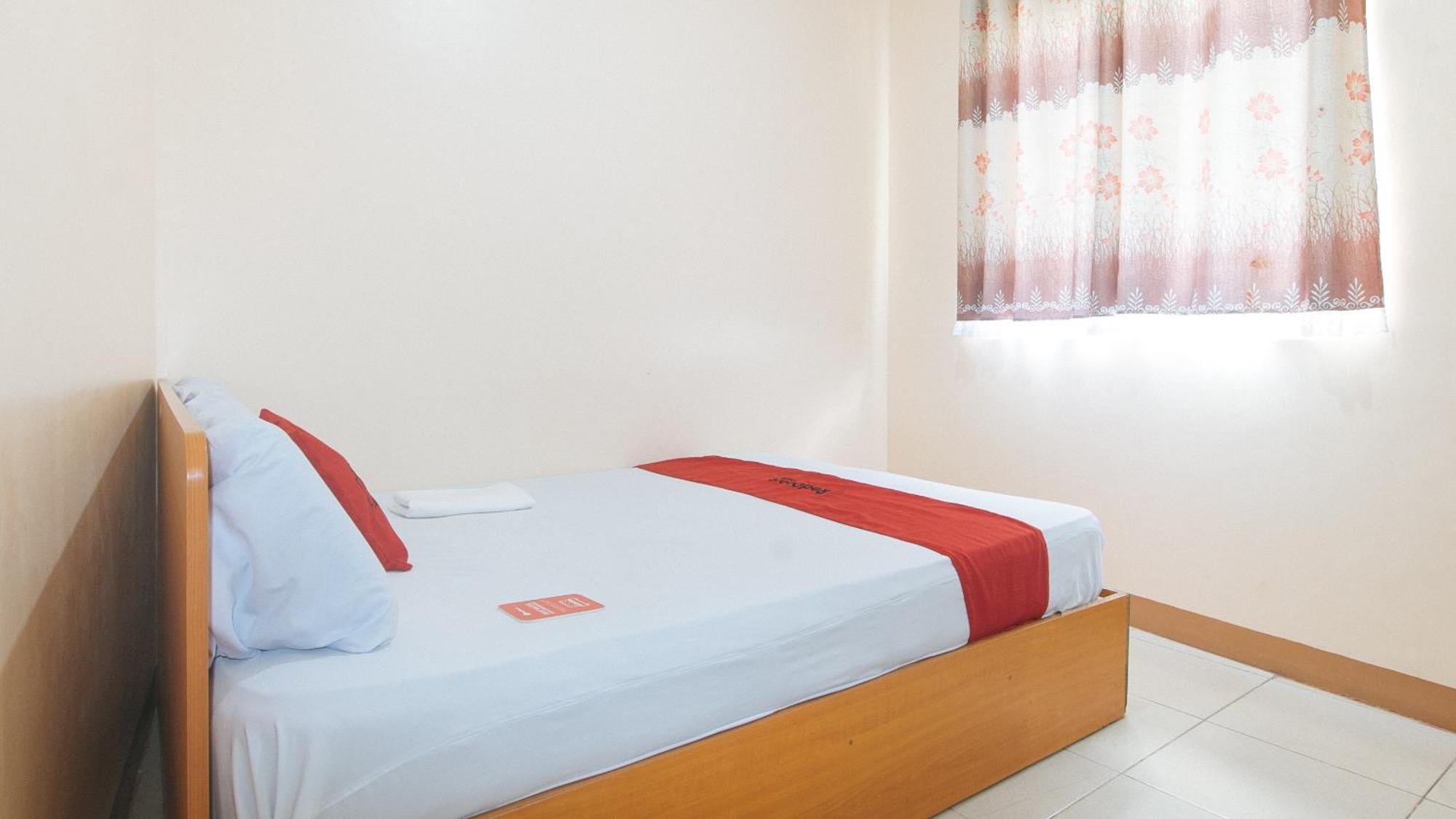 Reddoorz @ Asiana Pension Inn Мандауэ Экстерьер фото